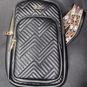 Black Quilted Crossbody Bag with Patterned Strap